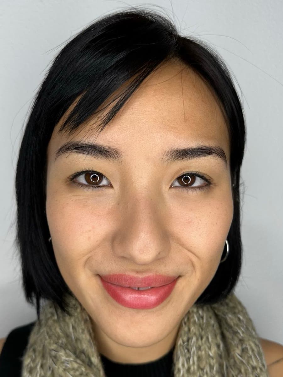 Microblading LA lip blush client smiling with her fresh lip blush
