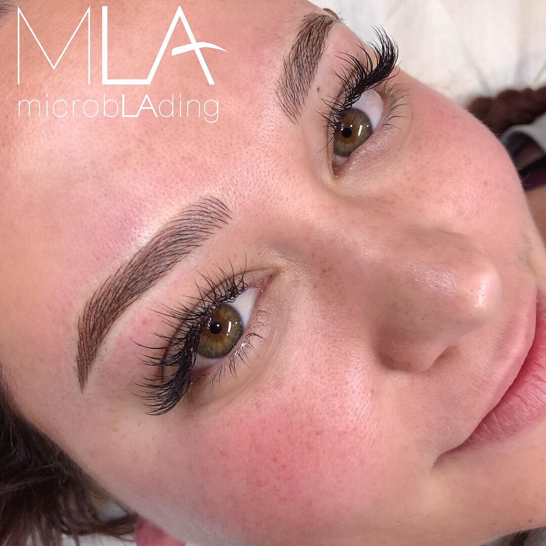 Combo brows on a freckled woman with hazel eyes: feathered warm brown strokes in a natural-looking arch, Microblading LA