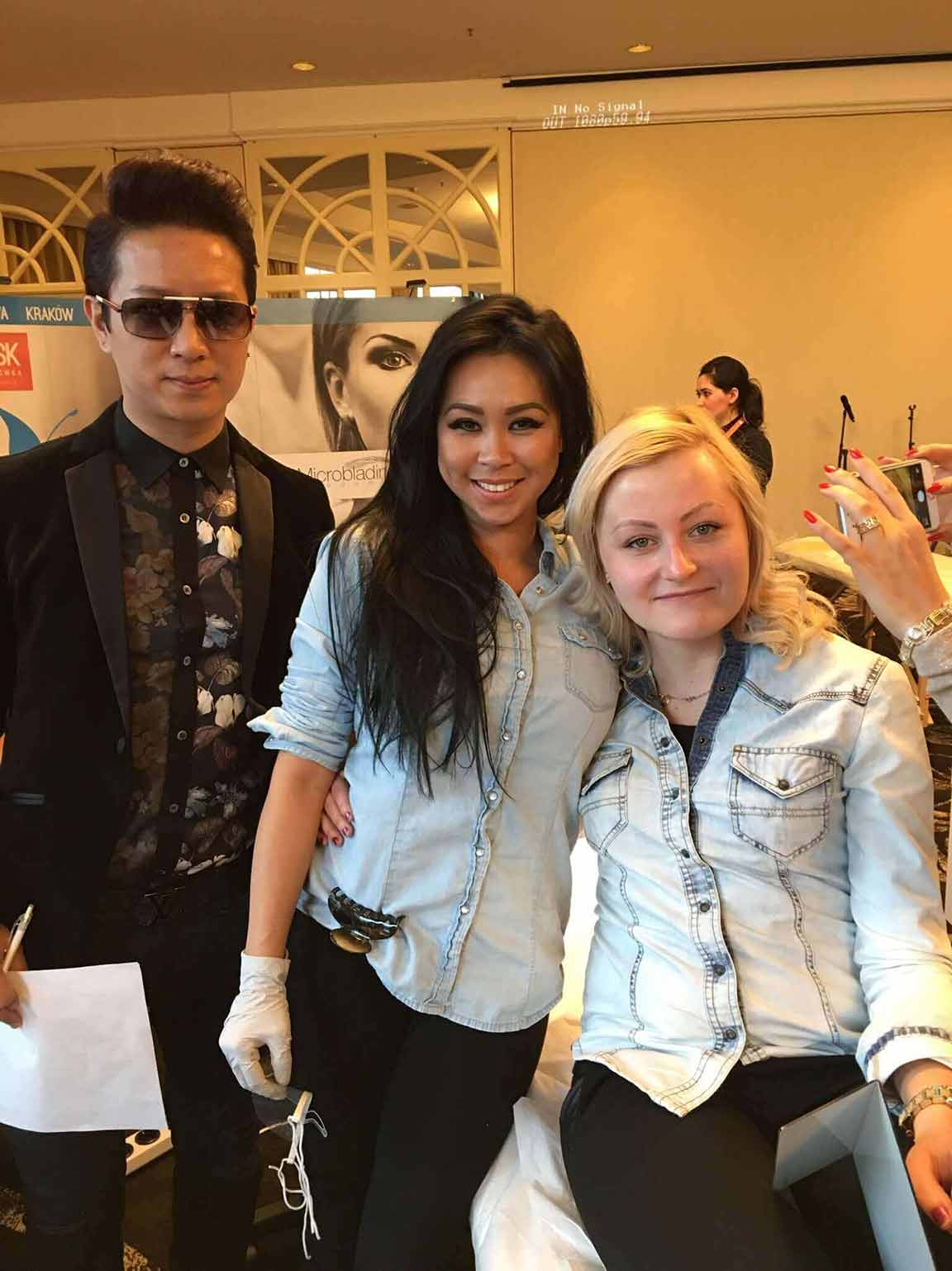 World of Microblading Judge David Zhang with champion Lindsey Ta and model